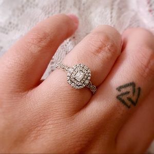 3/8 ct double frame vintage style engagement ring. Lightly worn.